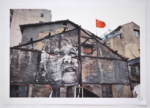The Wrinkles of the City, Action in Shanghai, Jiang Qizeng - Red Flag, China, 2010  by JR