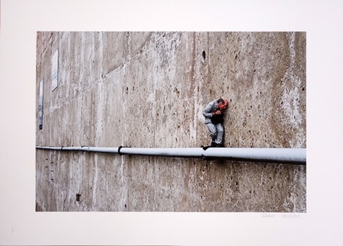 On The Edge  by Isaac Cordal